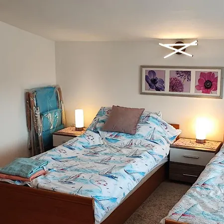 - Quarto em Acomodações Particulares